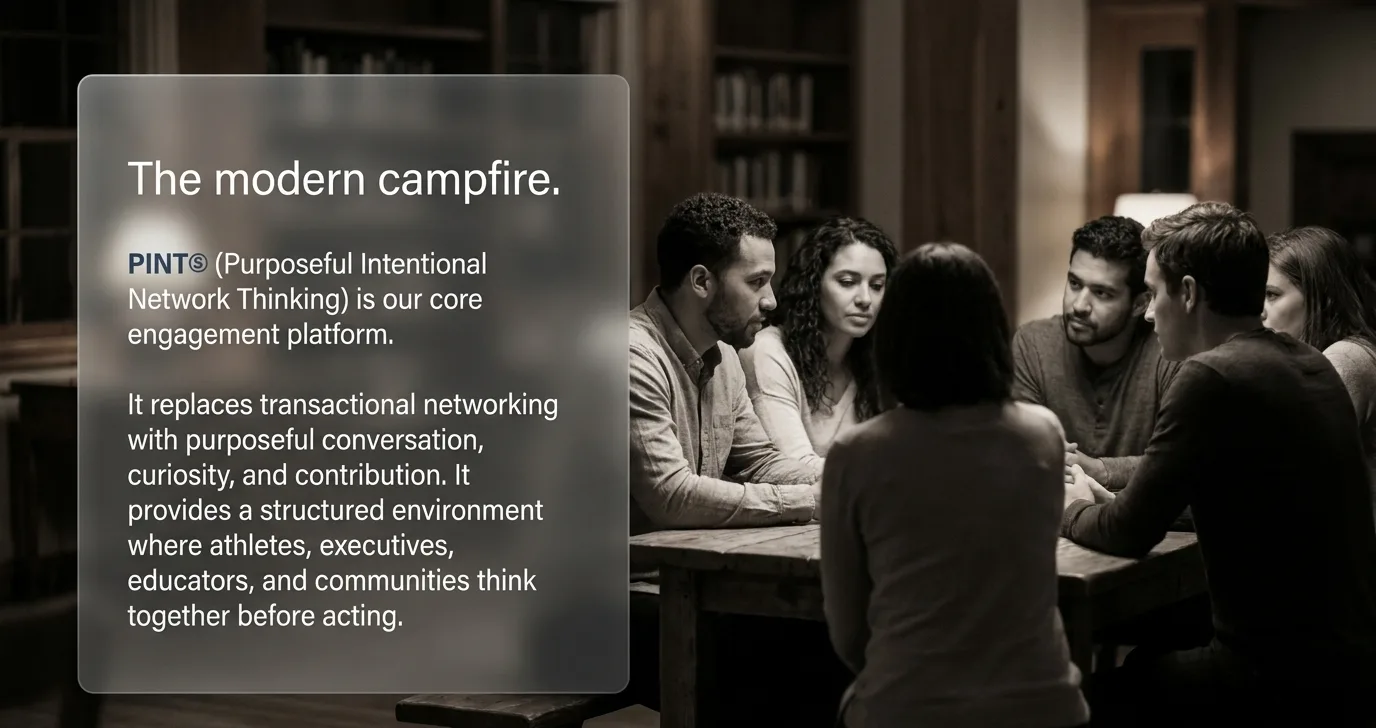 Founder brief slide: a small group in conversation around a library table — the modern campfire.